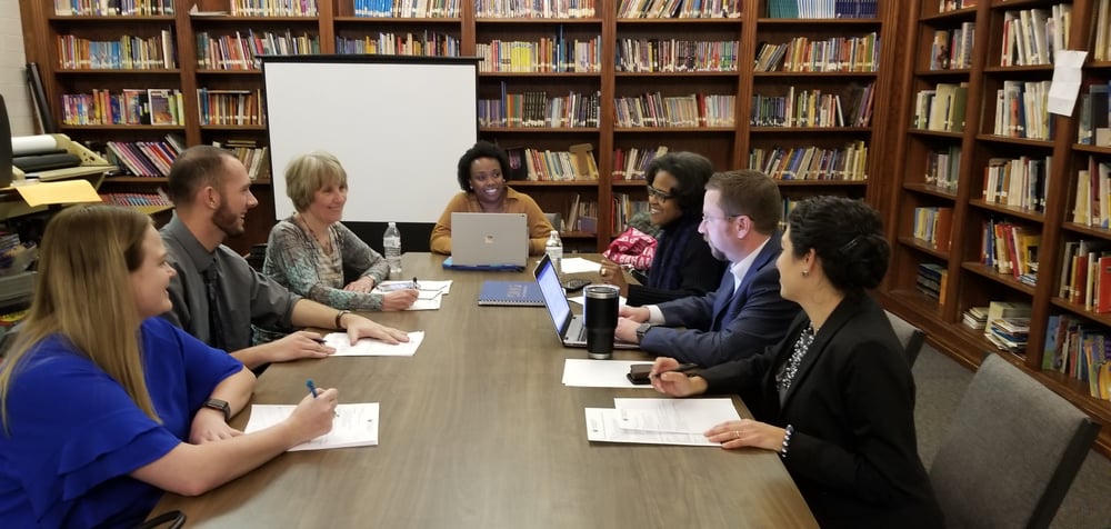 Business consulting session at Joy Lough Enterprises